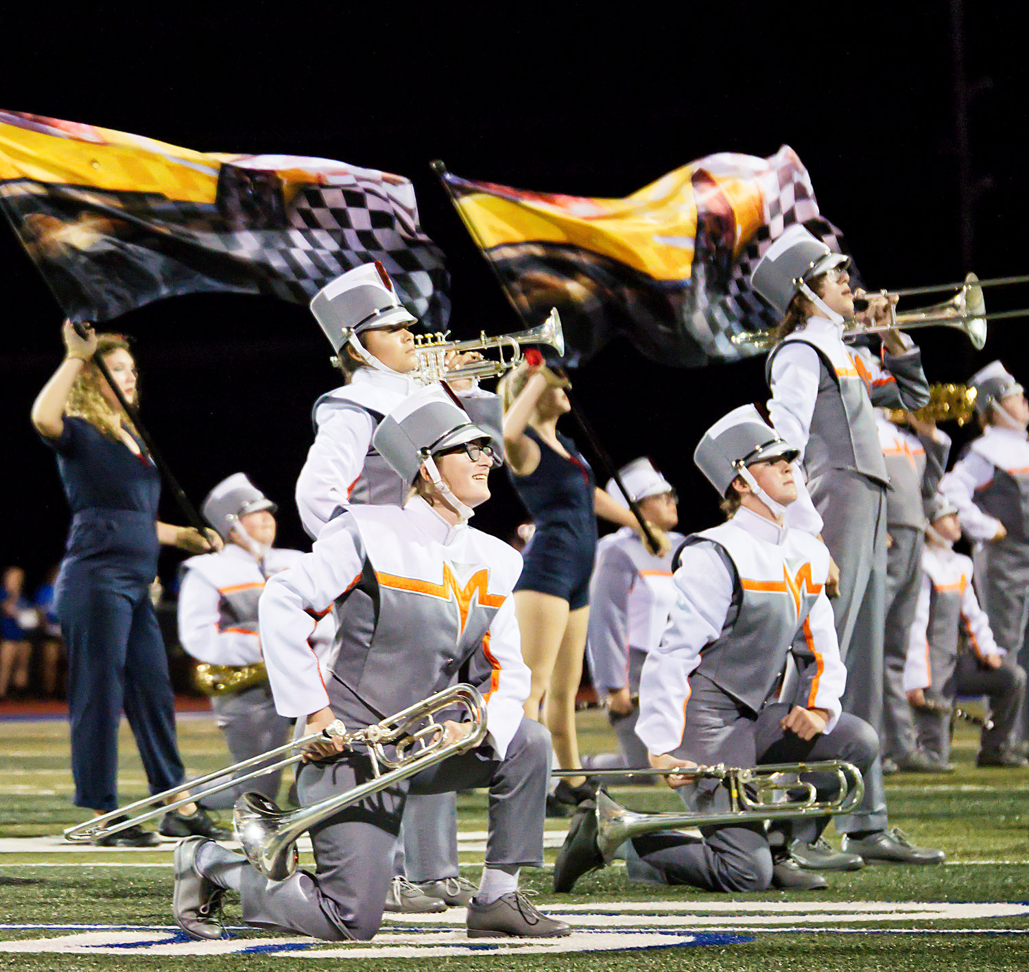 Mineola Sound of the Swarm members during a recent halftime performance.